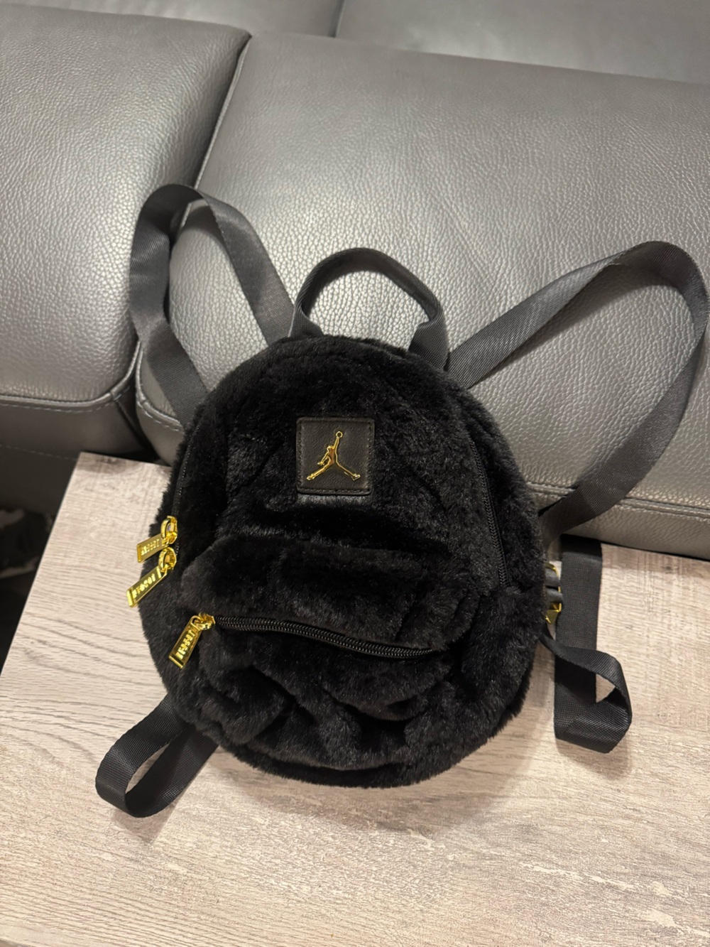 Jordan Black Faux Fur Mini Backpack with Gold Accents